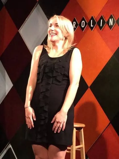 Anne Marie on a comedy club stage
