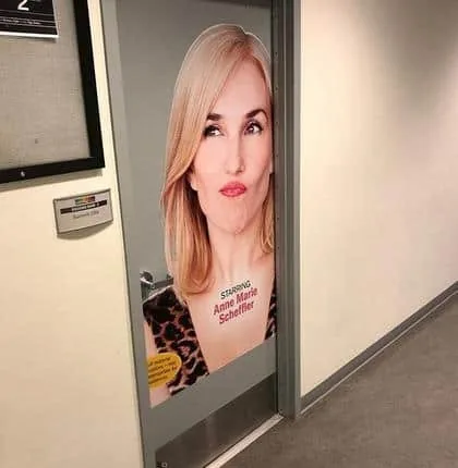 MILF Life Crisis poster on a dressing room door