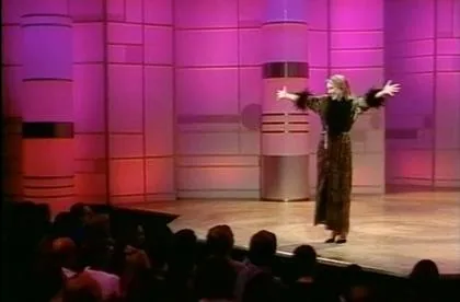Anne Marie performing on a large theatre stage